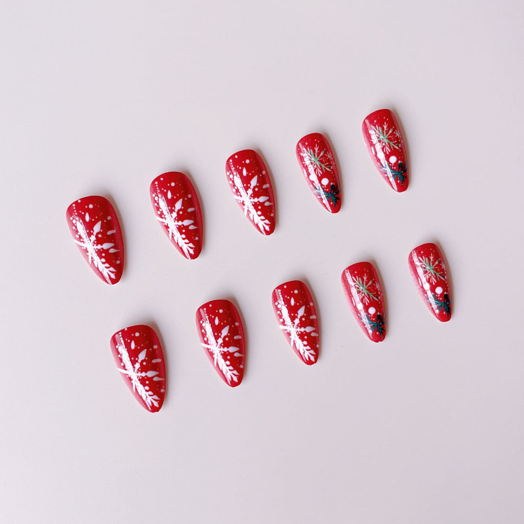 Acrylic nail set with festive motifs and handmade decorations Bowlift