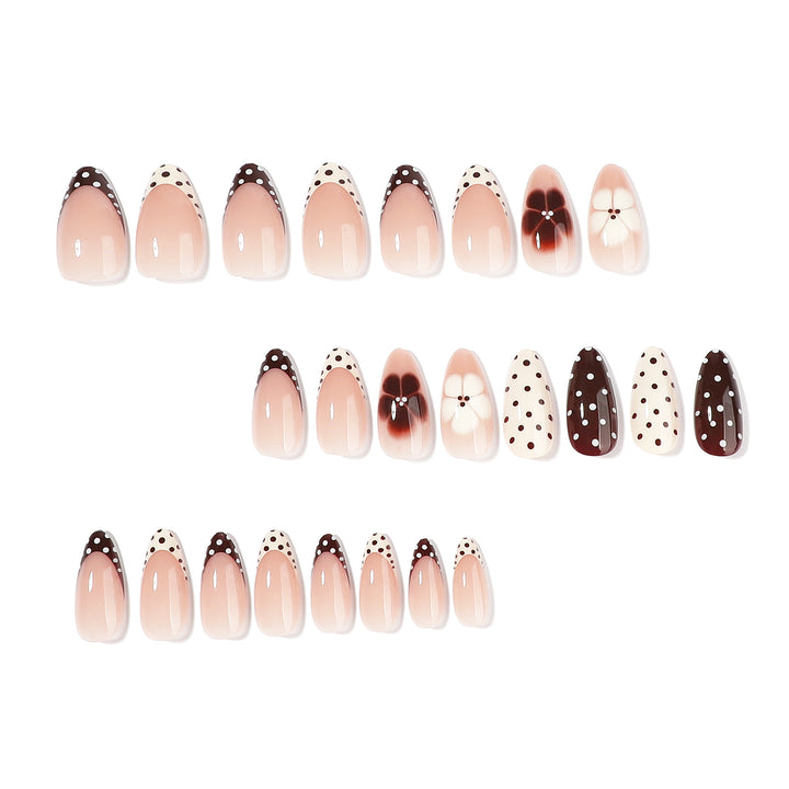 Artful nail art with floral design and various patterns Bowlift