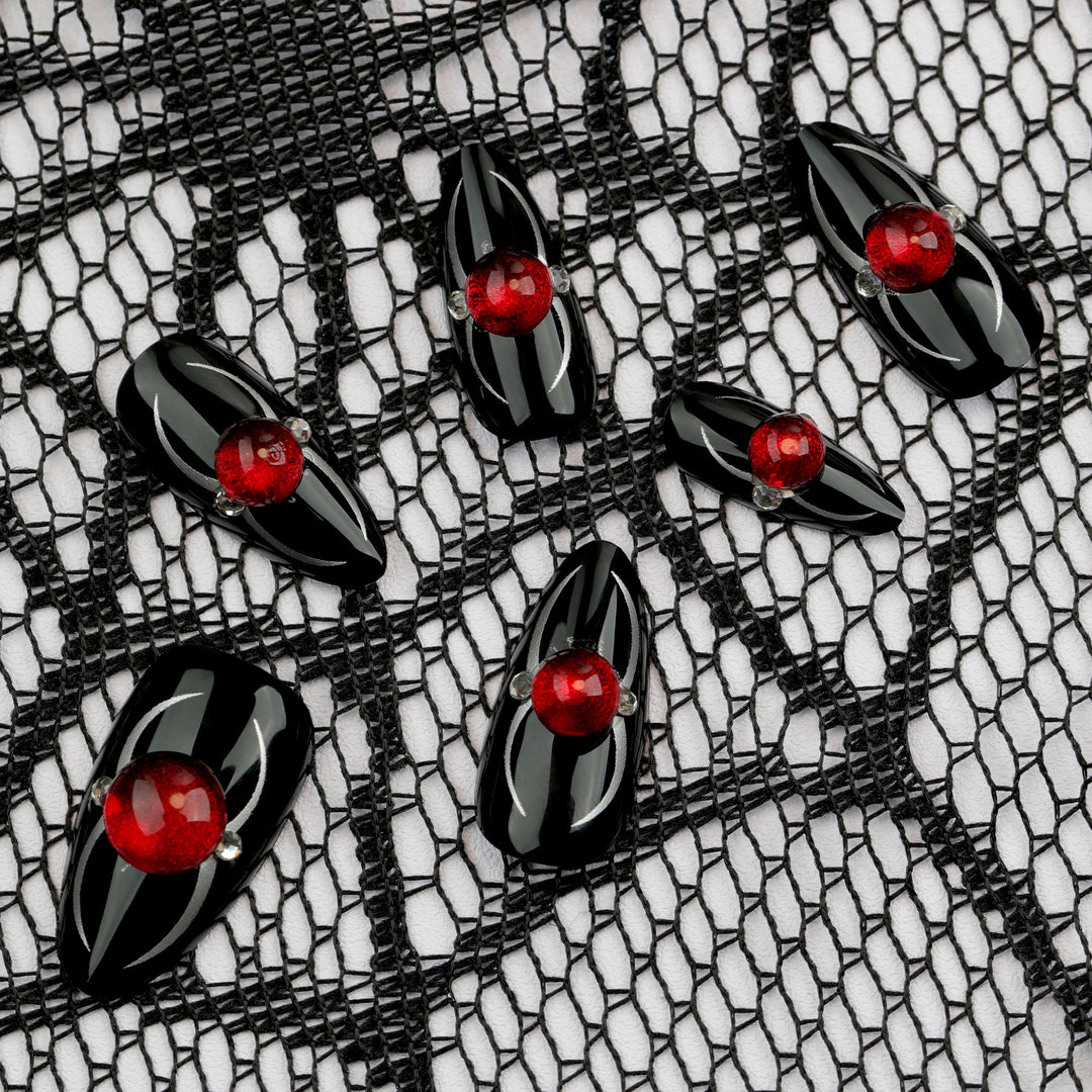 Glamorous stiletto nails with radiant accents Bowlift