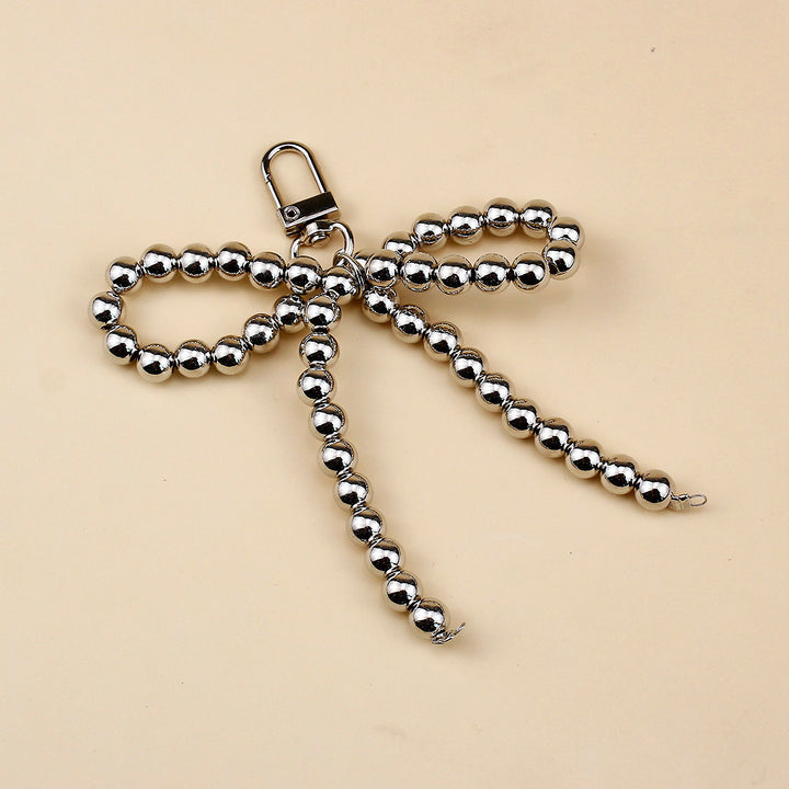 Elegant Pearl Bow Brooch Bowlift