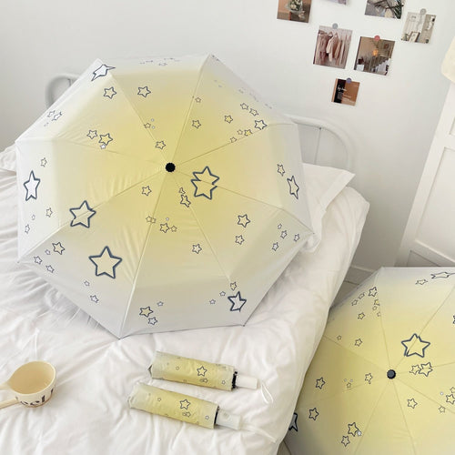 Women's compact folding umbrella with star pattern Bowlift