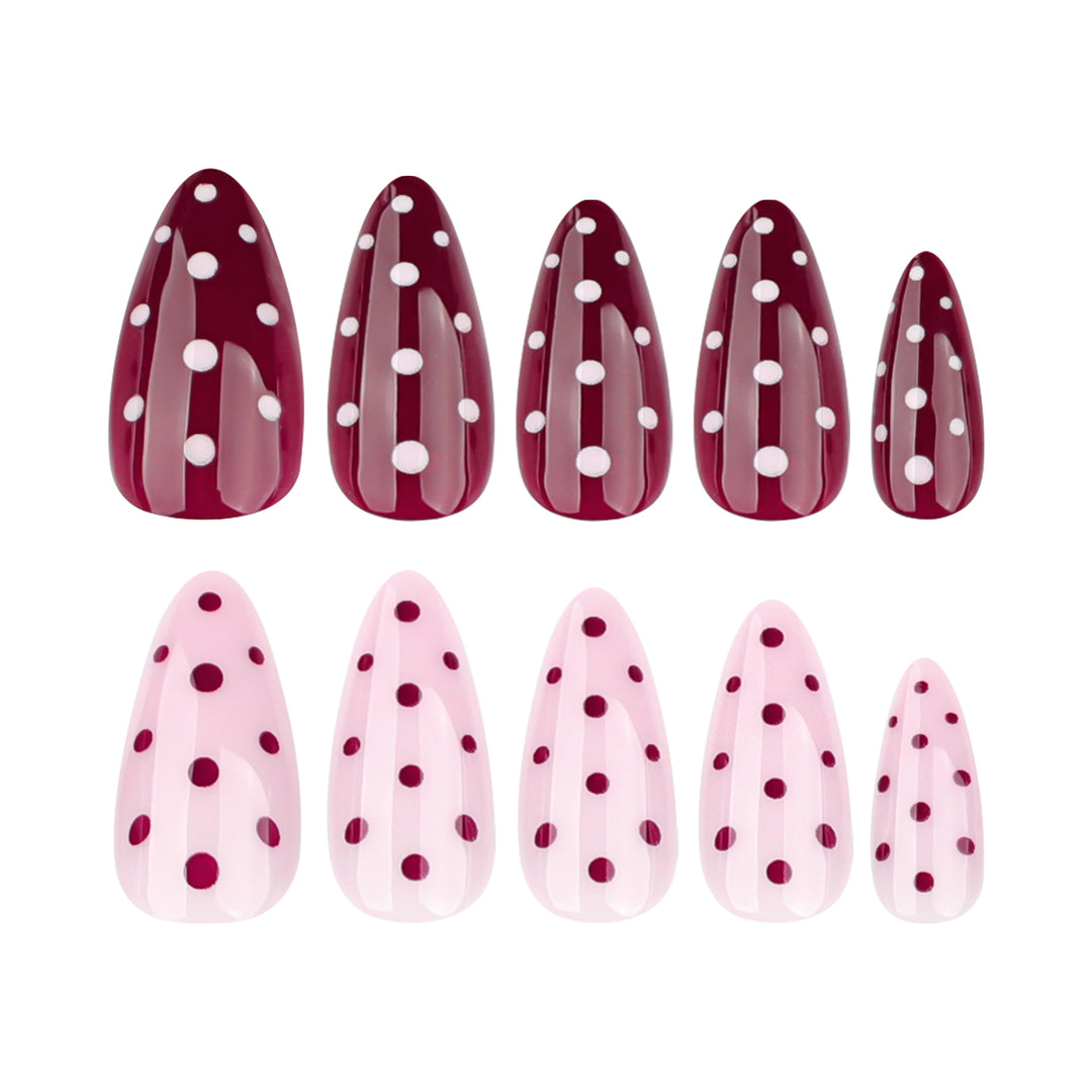 Artful Nail Extensions with Dots and Elegant Accents Bowlift