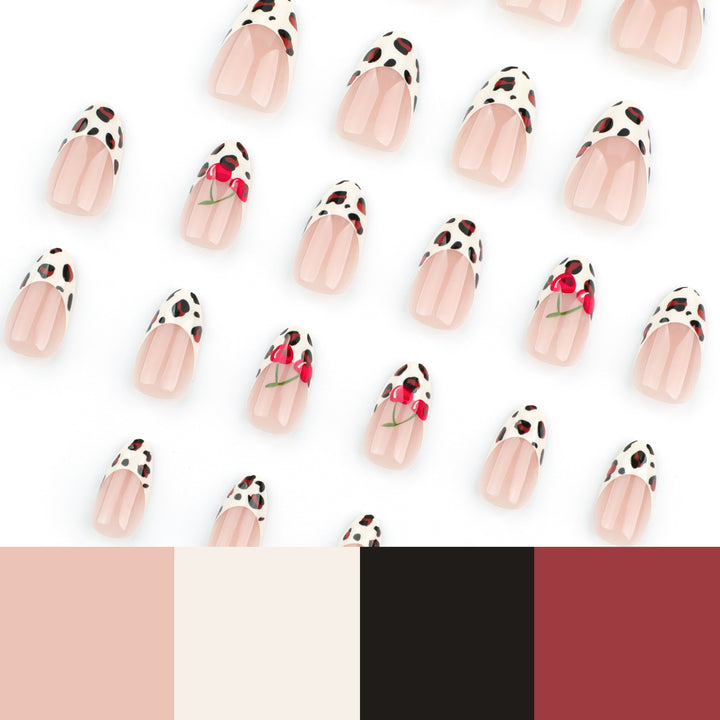 Artful animal pattern nails with cherry accents Bowlift