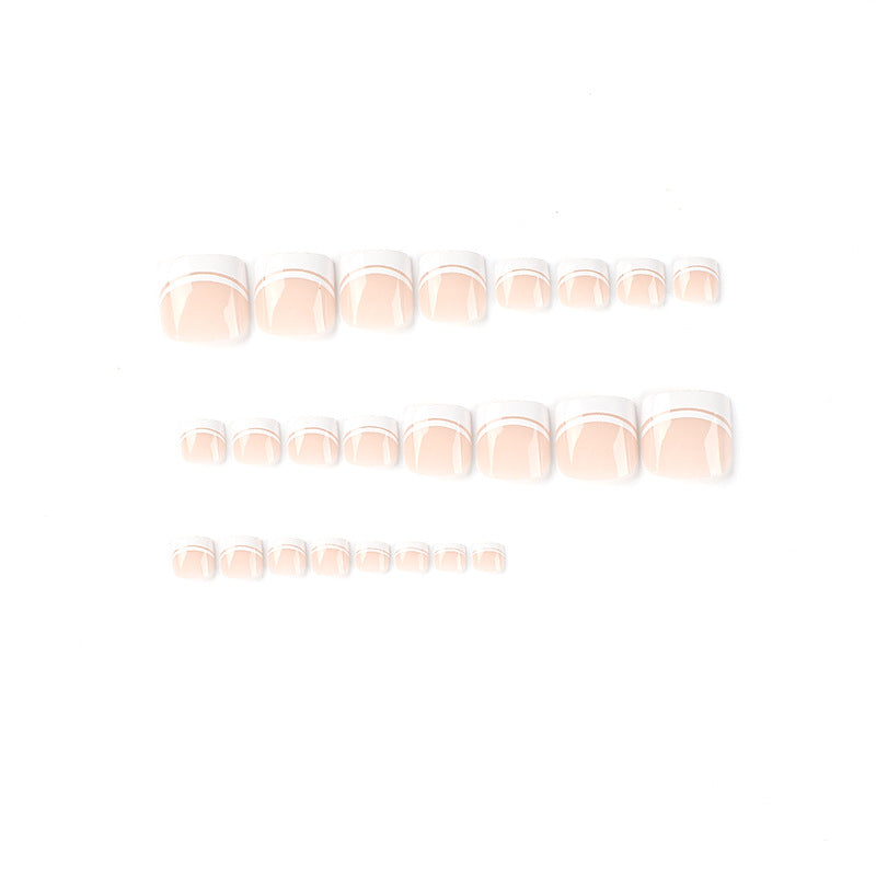 Artful toenail art with elegant French tip design Bowlift