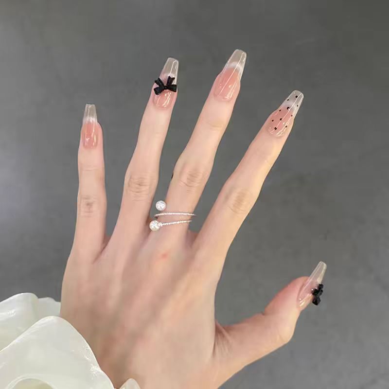 Decorative Press-On Nail Set with Unique Bow Accents Bowlift