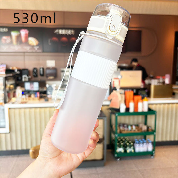 Ladies practical and leak-proof drinking bottle with integrated carrying strap Bowlift