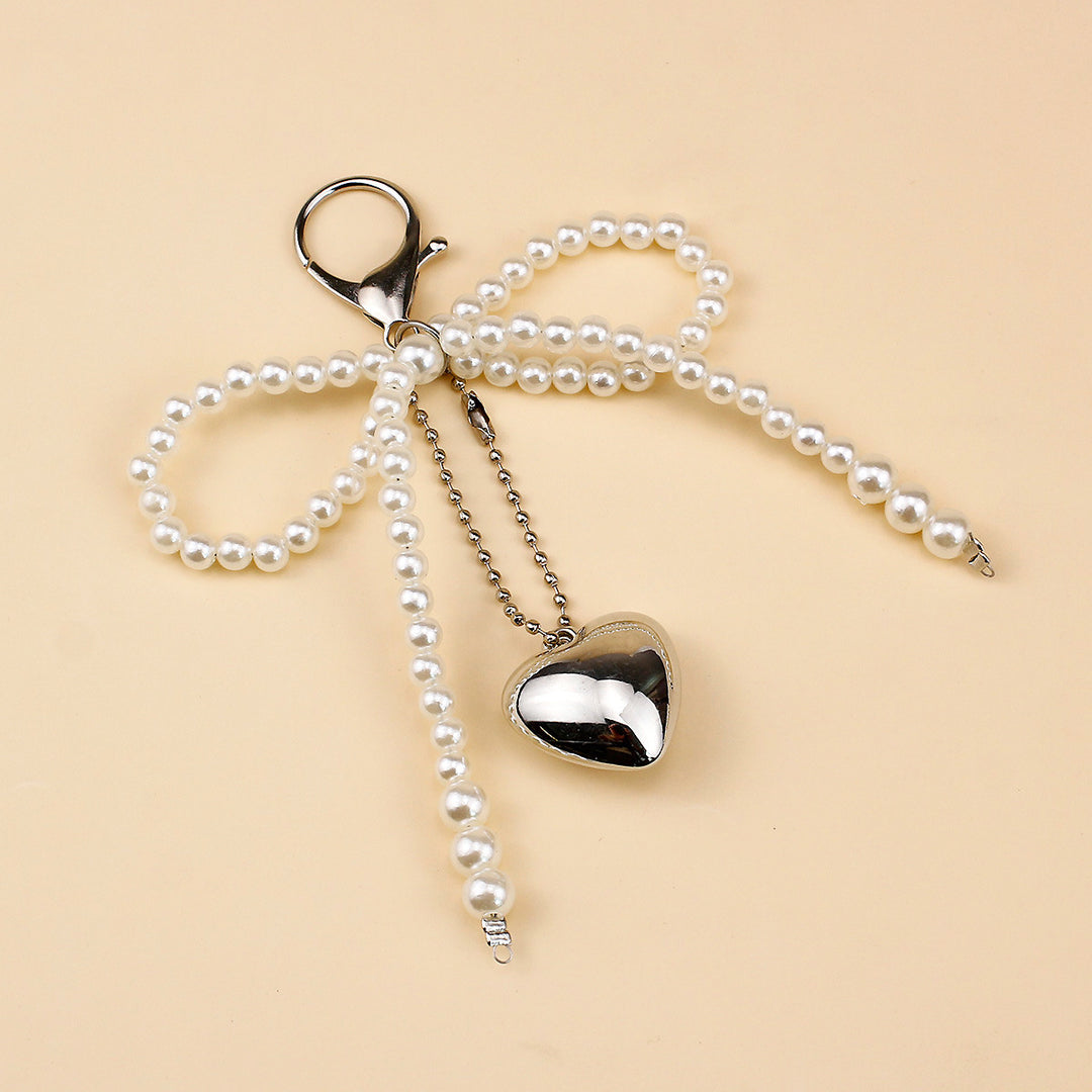 Elegant Pearl Bow Brooch Bowlift