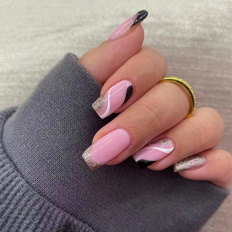 Trendy Nail Art with Glitter and Wave Accents Bowlift
