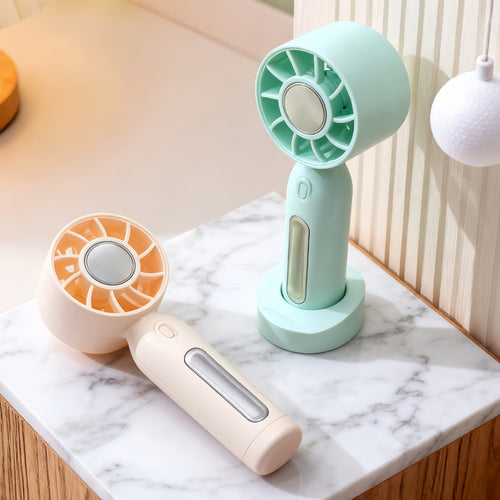 Ladies portable handheld fan with USB charging port and ergonomic design Bowlift