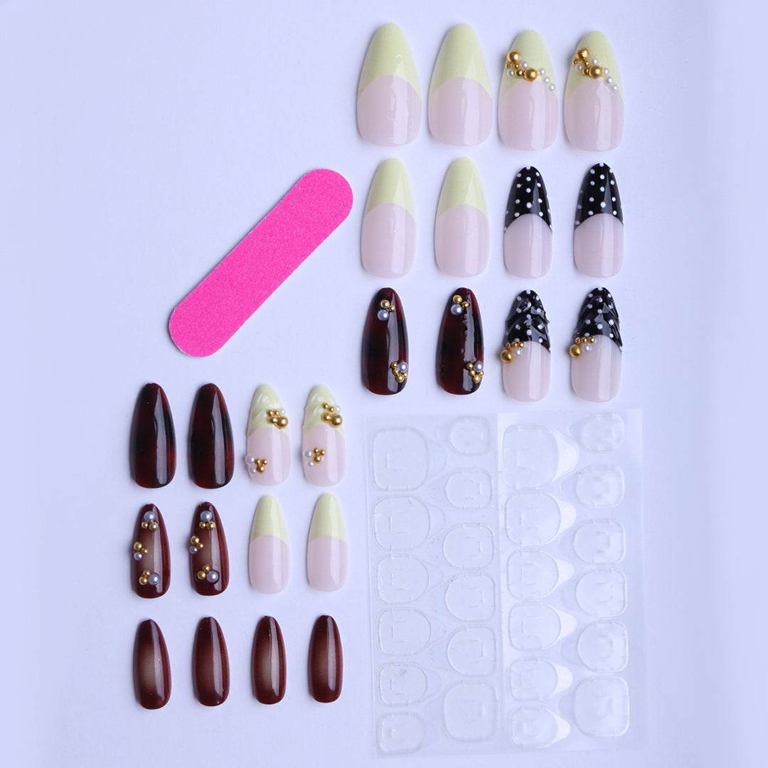 Artistic fingernails with gold applications Bowlift