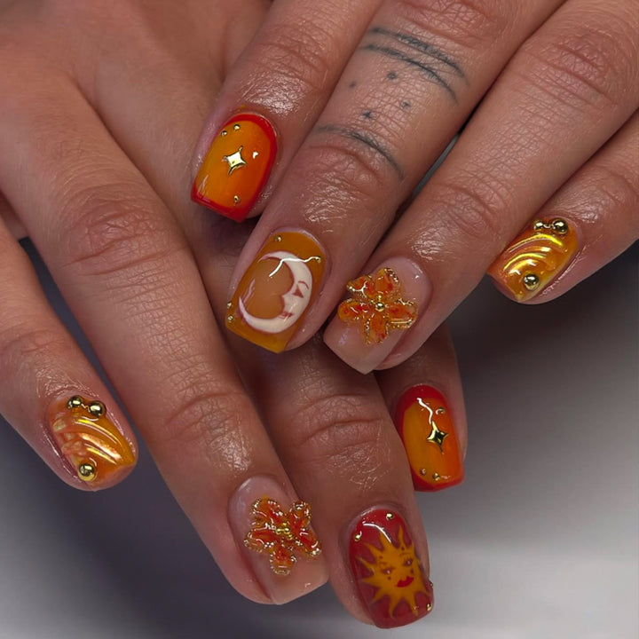 Artificial nails with floral motifs and glitter accents Bowlift