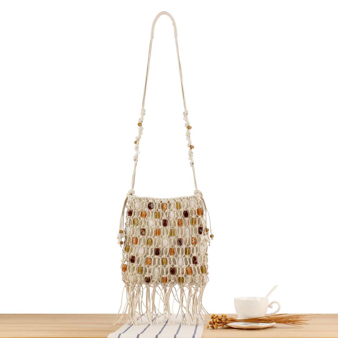 Hand-knotted shoulder bag with decorative beads and fringes Bowlift