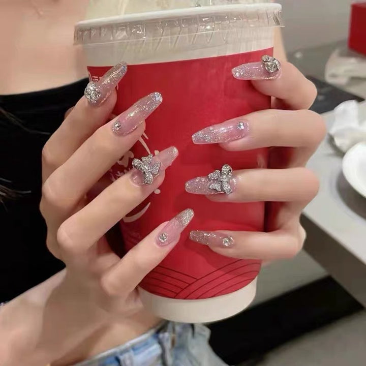 Glamorous artificial nails with sparkling accents Bowlift