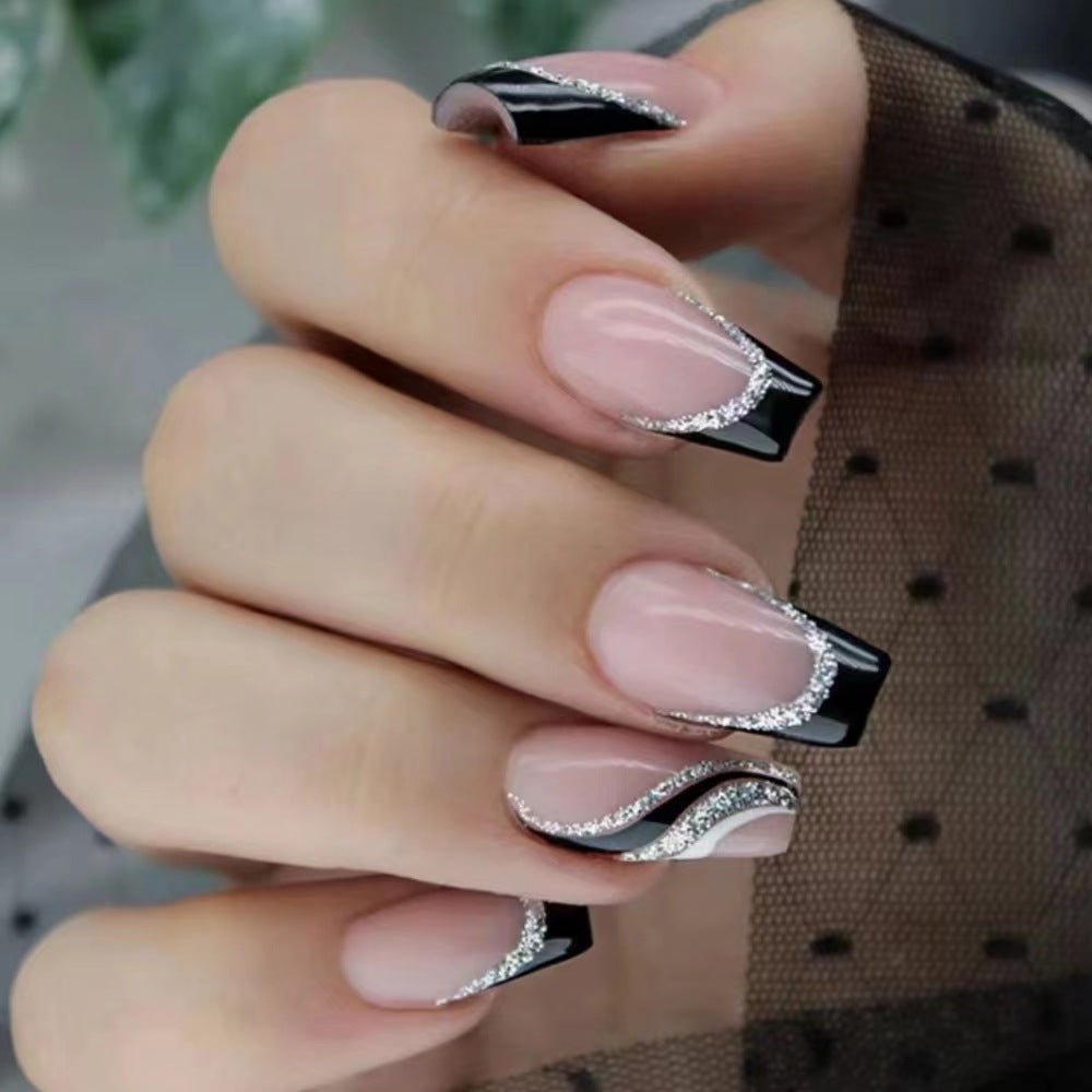Elegant nail design with bow and rhinestone details Bowlift