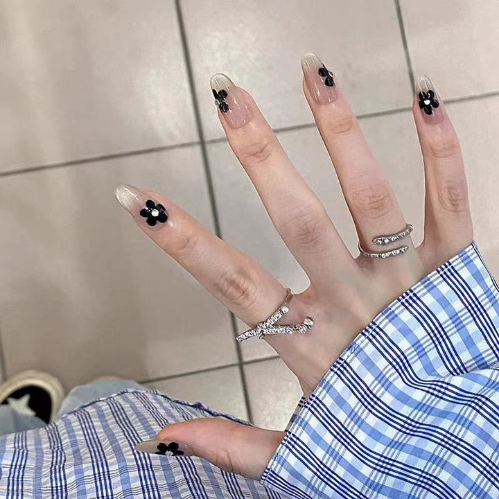 Artificial nails with elegant floral decorations Bowlift