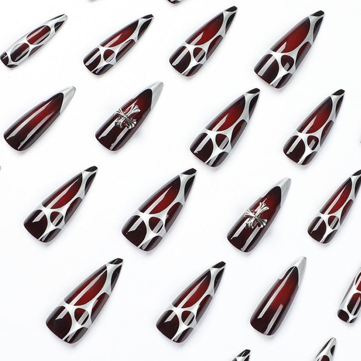 Artful Stiletto Nails with Elegant Cross Decoration Bowlift