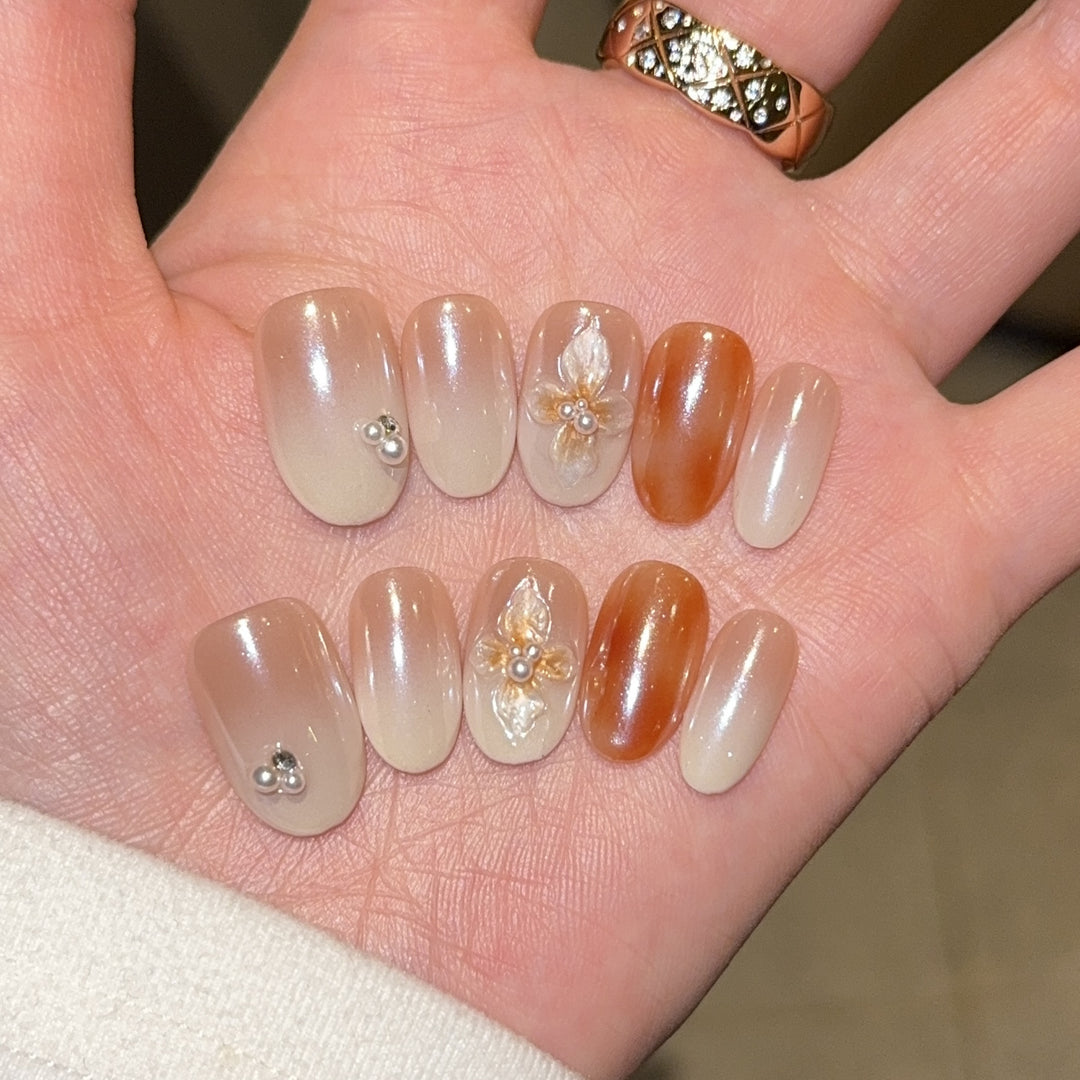 Artificial nails with floral details and glitter coating Bowlift