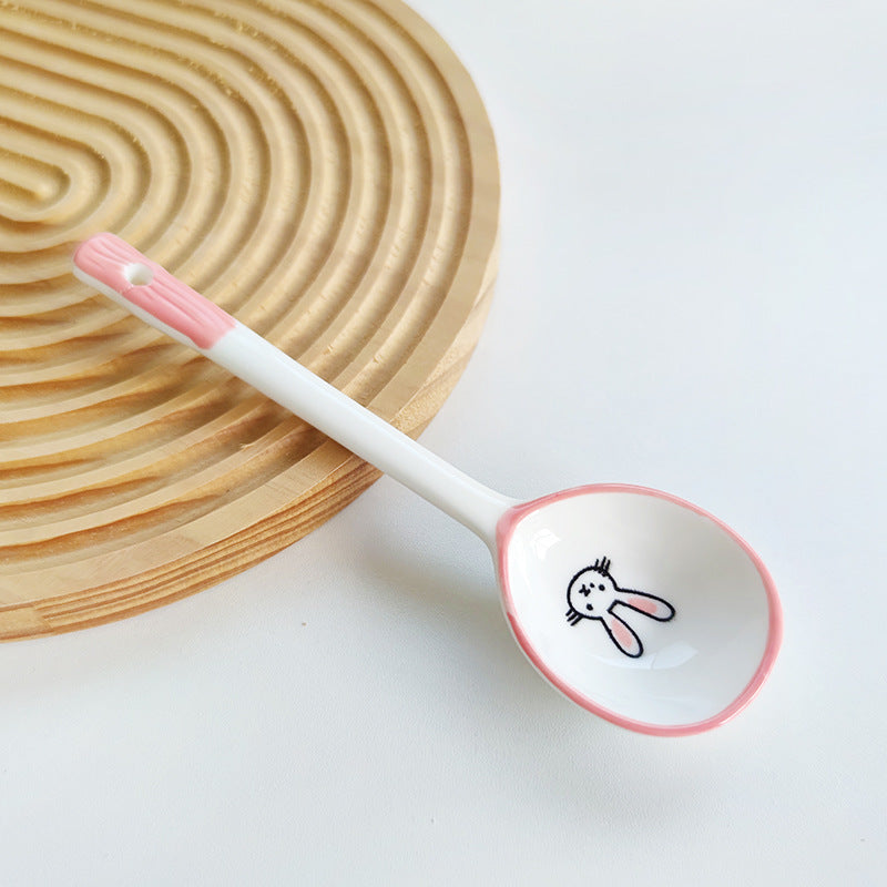 Ceramic soup spoon with lucky cat illustration and ergonomic long-handle Bowlift