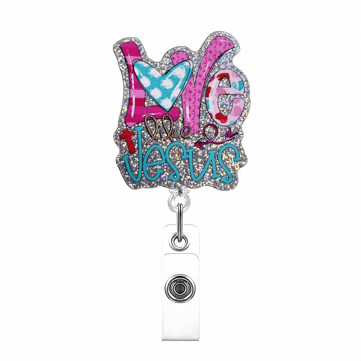 Expandable badge holder with anatomical heart pendant
