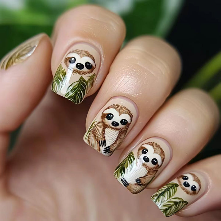 Art nails with cute sloth and leaf design Bowlift