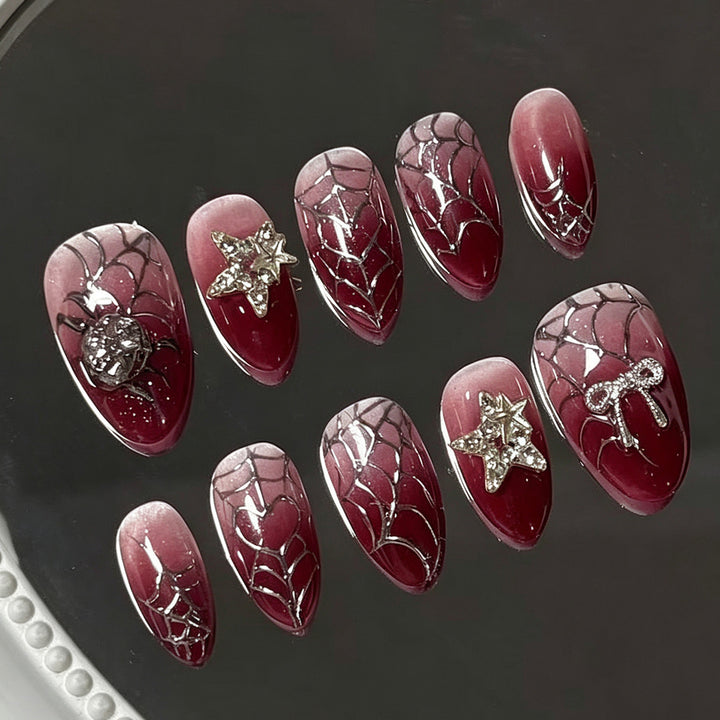 Glamorous artificial nails with rhinestones Bowlift