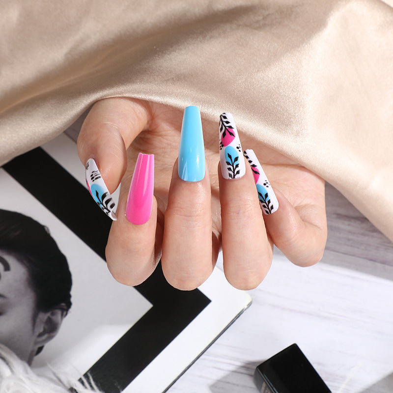 Artificial nails with floral design and creative accents Bowlift