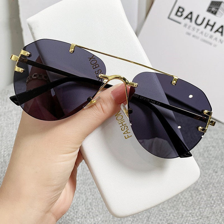 Ladies trendy sunglasses in elegant, polygonal design Bowlift