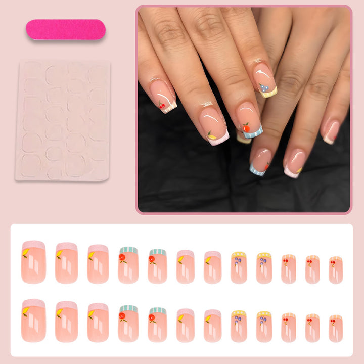 Nail art set with cheerful fruit designs and colorful accents Bowlift