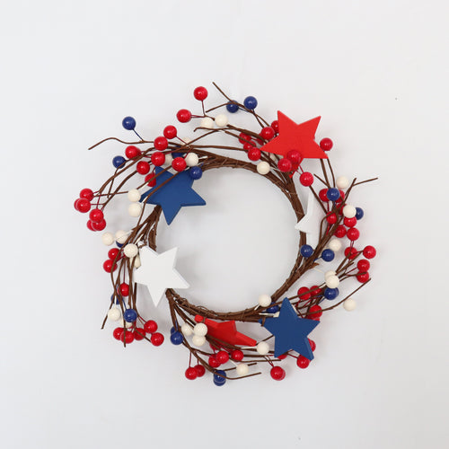 Unisex decorative door wreath with wooden stars and berry branches Bowlift