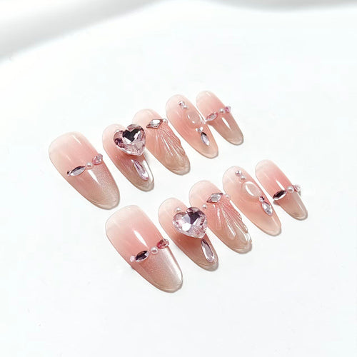 Elegant artificial nails with glitter accents Bowlift