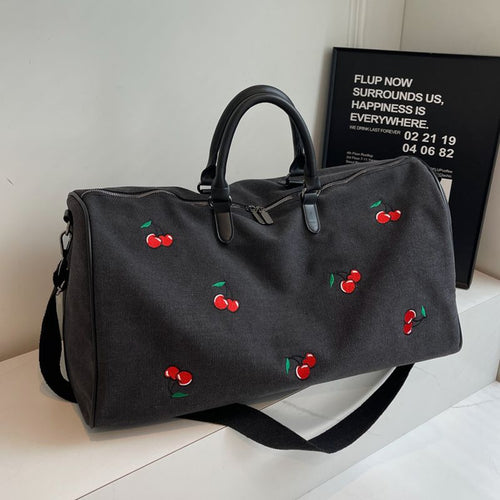 Sporty weekend bag with playful cherry pattern Bowlift