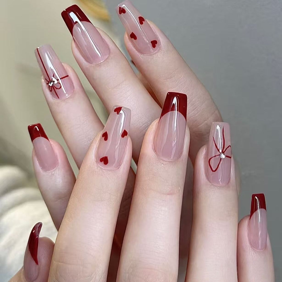Elegant Stiletto Press-On Nails with Floral and Glitter Accents Bowlift