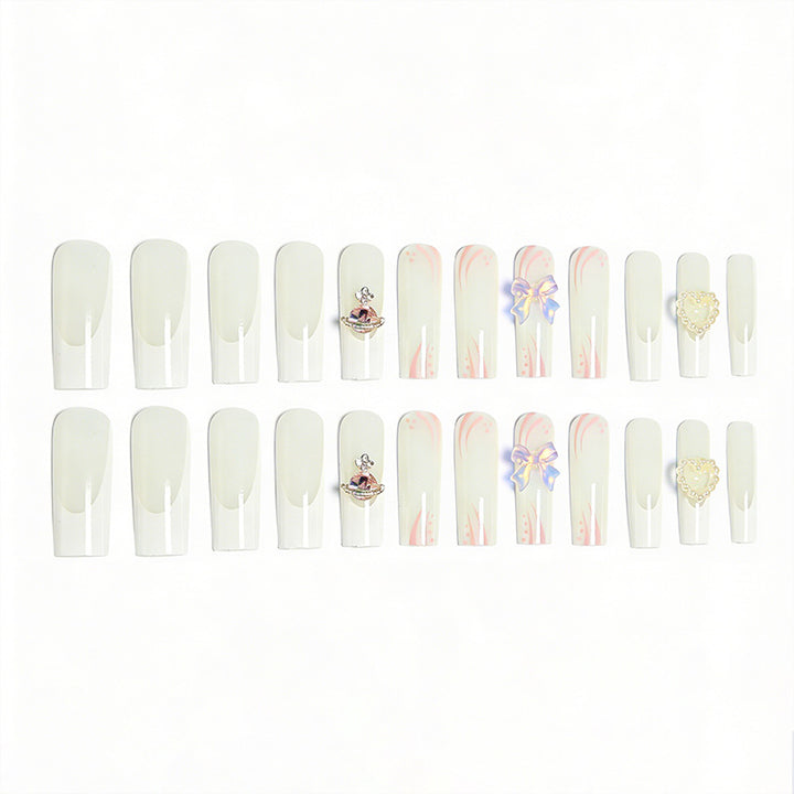 Artificial nails with delicate embellishments Bowlift