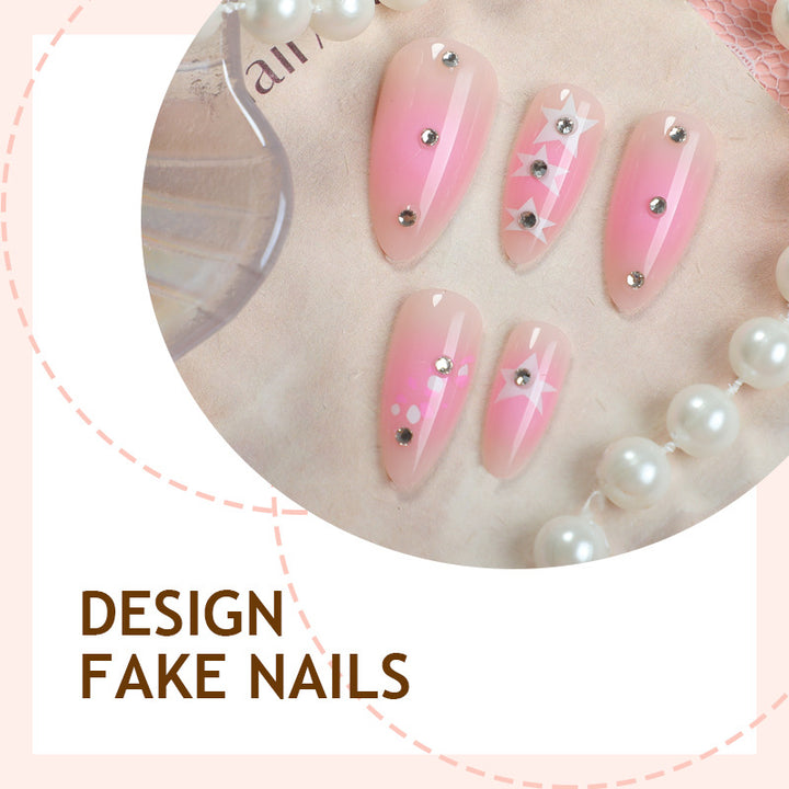 Artificial nail set with sparkling rhinestone accents and playful star motifs Bowlift