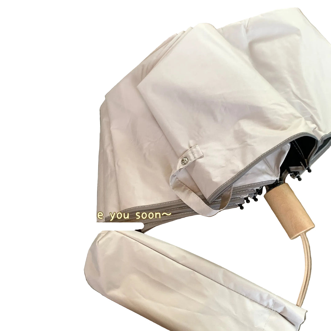 Women's automatic folding umbrella with elegant design and ergonomic wooden handle Bowlift