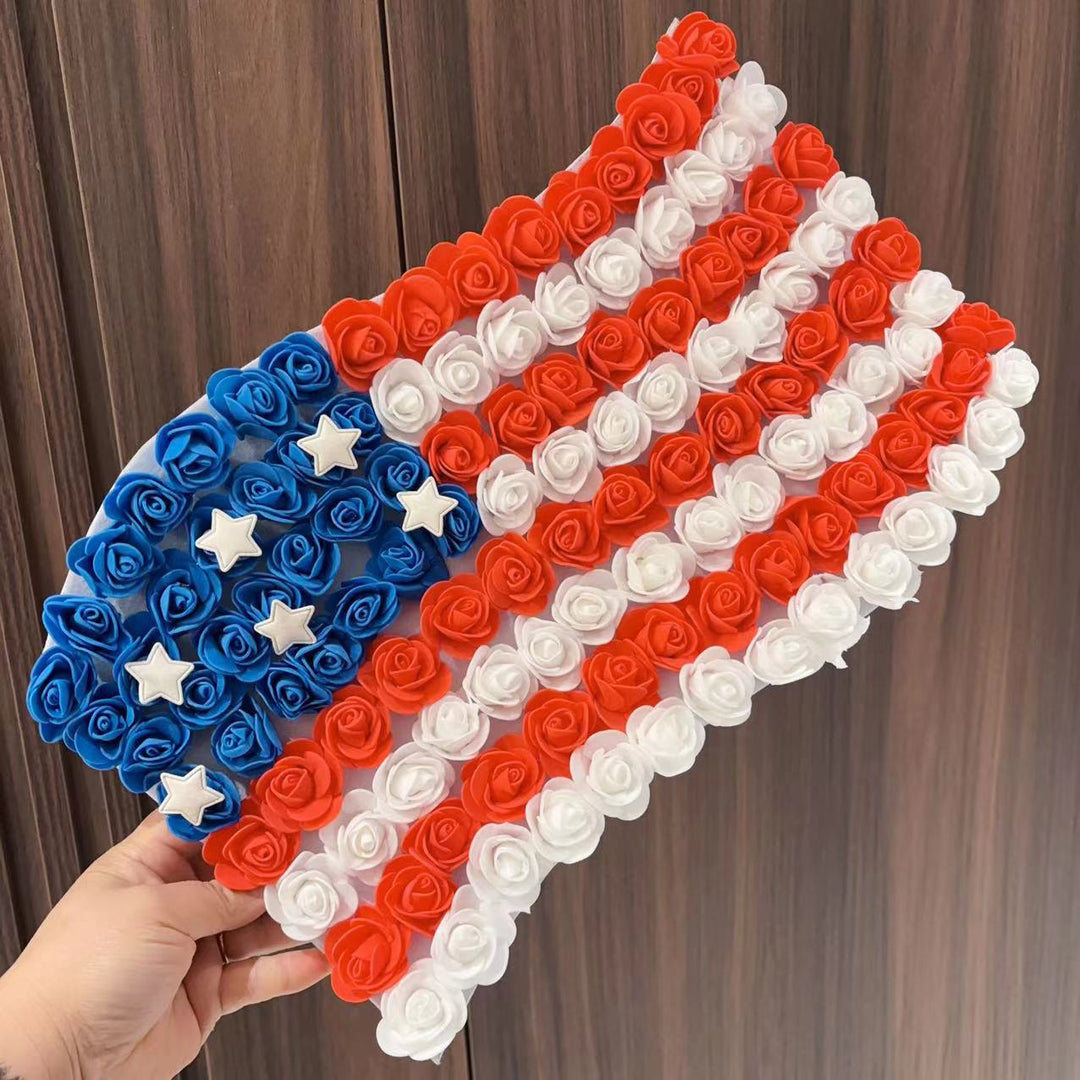 Unisex hanging decoration in flag shape made of foam roses with star applications Bowlift