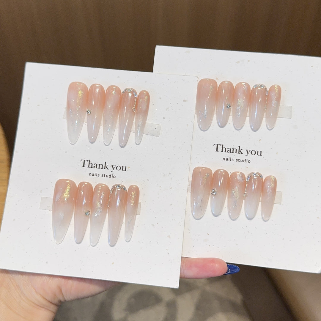 Artificial Nail Set with Elegant Glitter Accents Bowlift