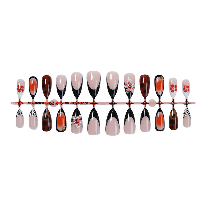 Artificial nail set with floral and creative decorations Bowlift