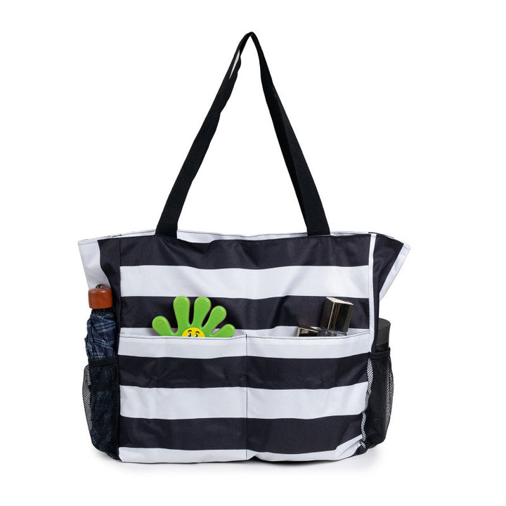 Spacious beach bag with practical outer pockets Bowlift