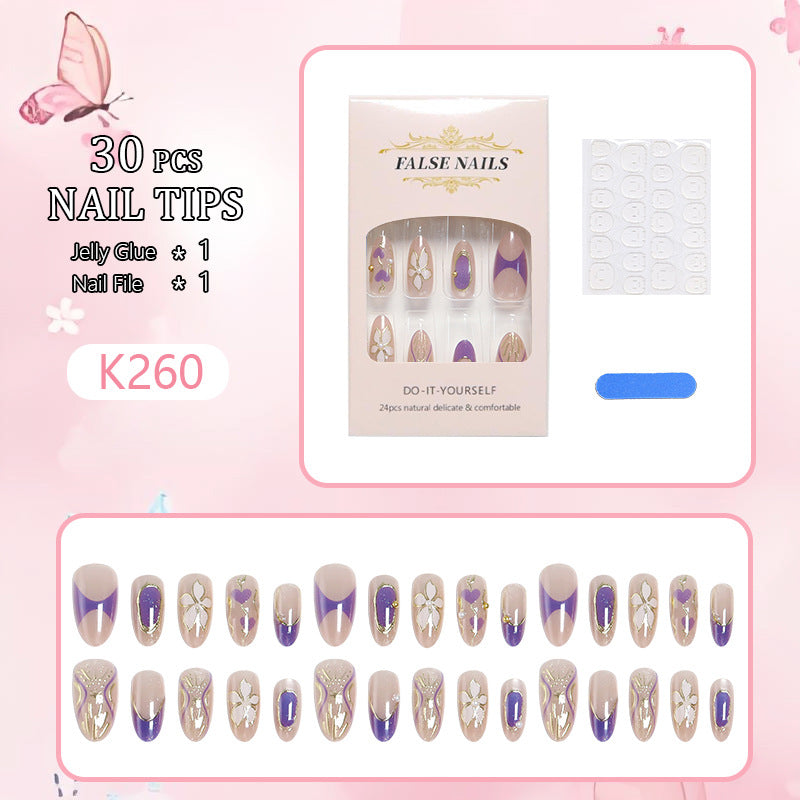 Elegant artificial nails with floral design and color accents Bowlift