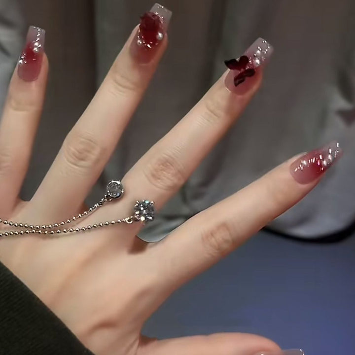 Nail art set with elegant 3D flower and butterfly decorations Bowlift
