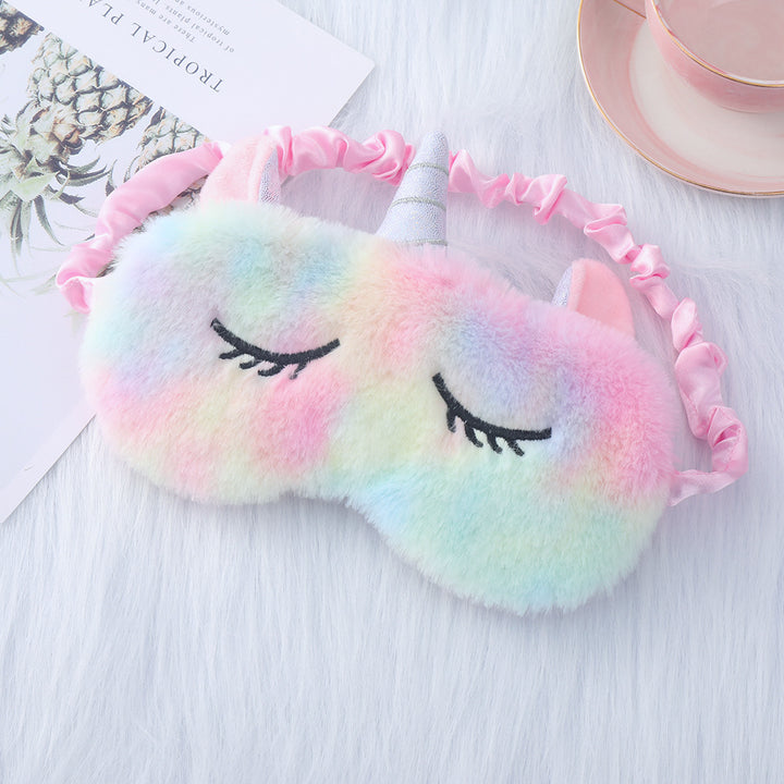 Women's plush-filled unicorn sleep mask with 3D horn, embroidered eyelashes and adjustable satin band Bowlift