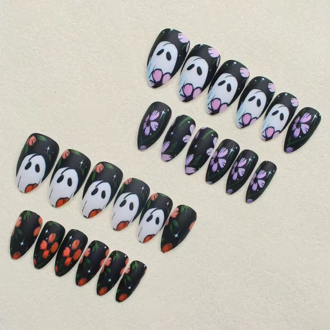 Artificial nail set with floral and spooky designs Bowlift