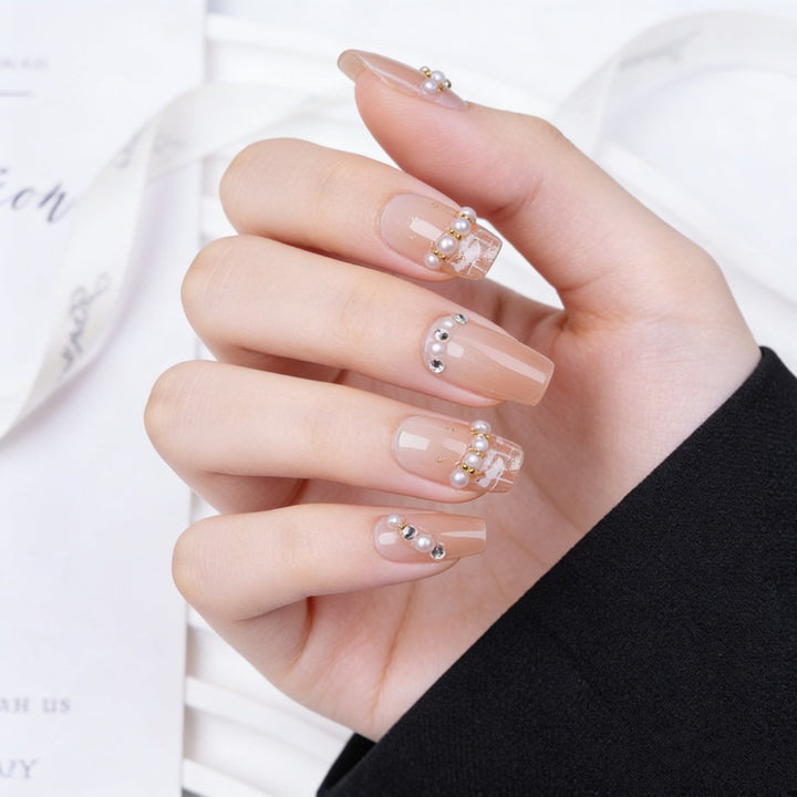 Elegant Press-On Nail Set with Decorative Pearls Bowlift