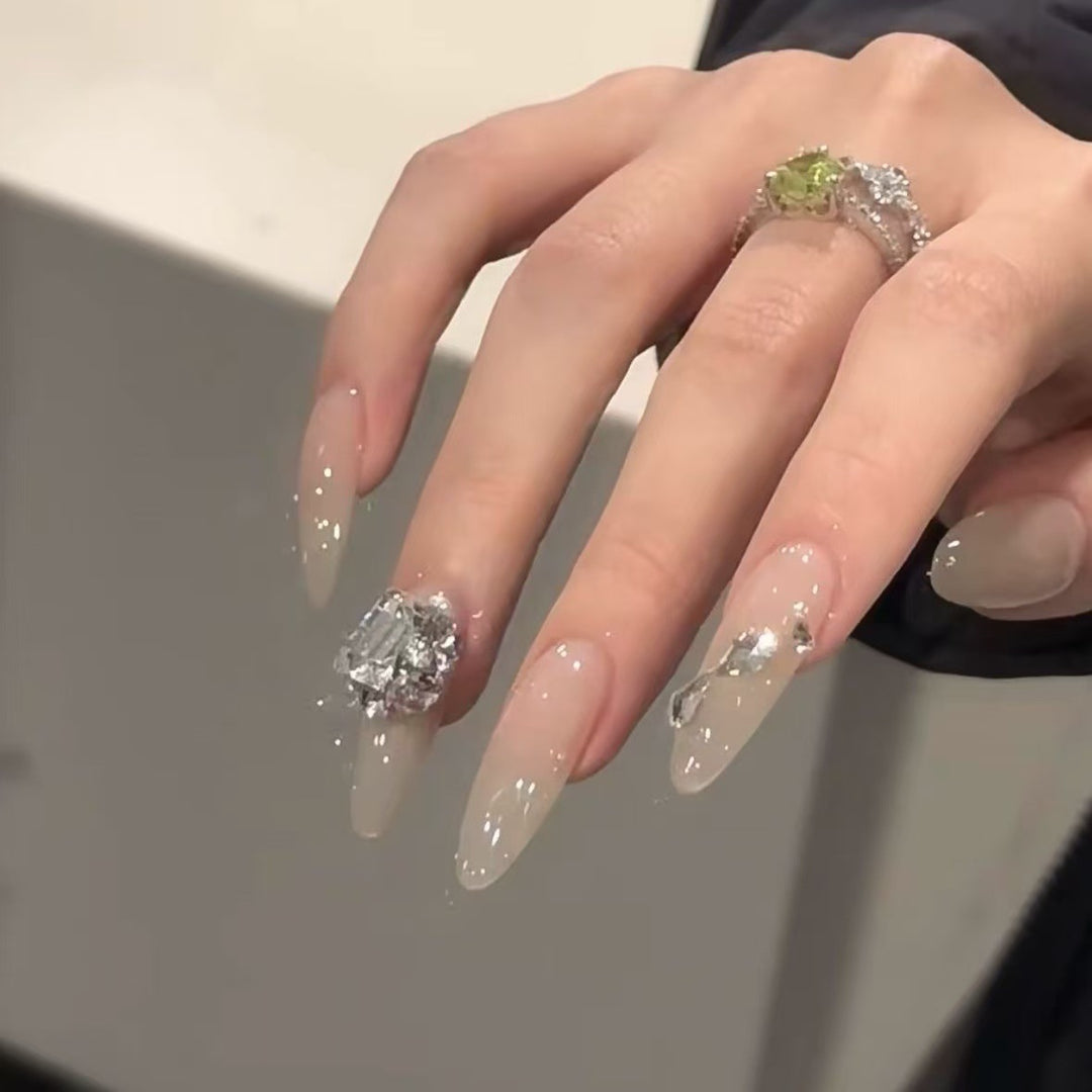 Elegant Stiletto Nail Extensions with Rhinestone Accents Bowlift