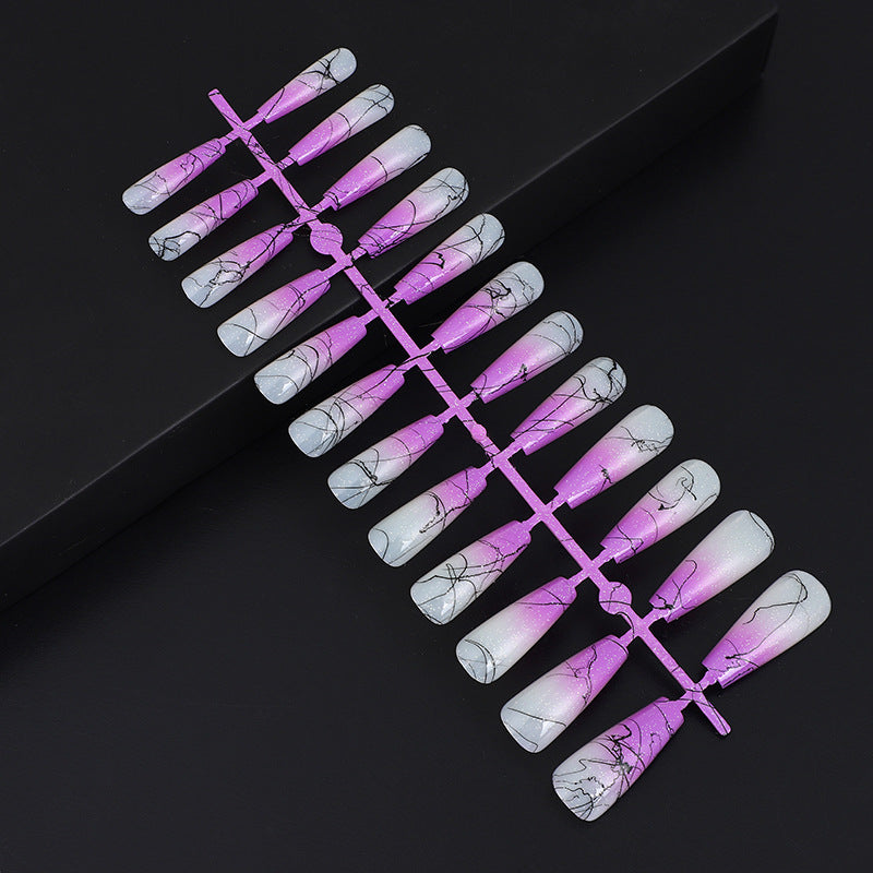 Artificial nails in modern ombre design with marbled accents Bowlift