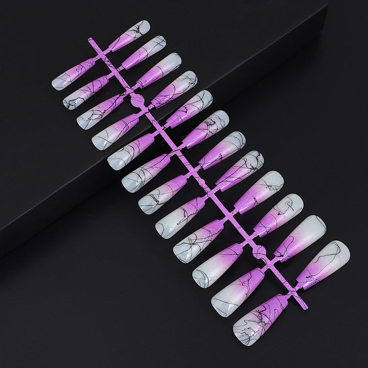 Artificial nails in modern ombre design with marbled accents Bowlift