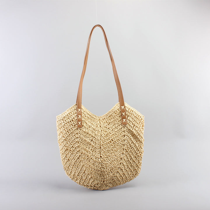 Casual bag made of handwoven straw with wide leather handles Bowlift