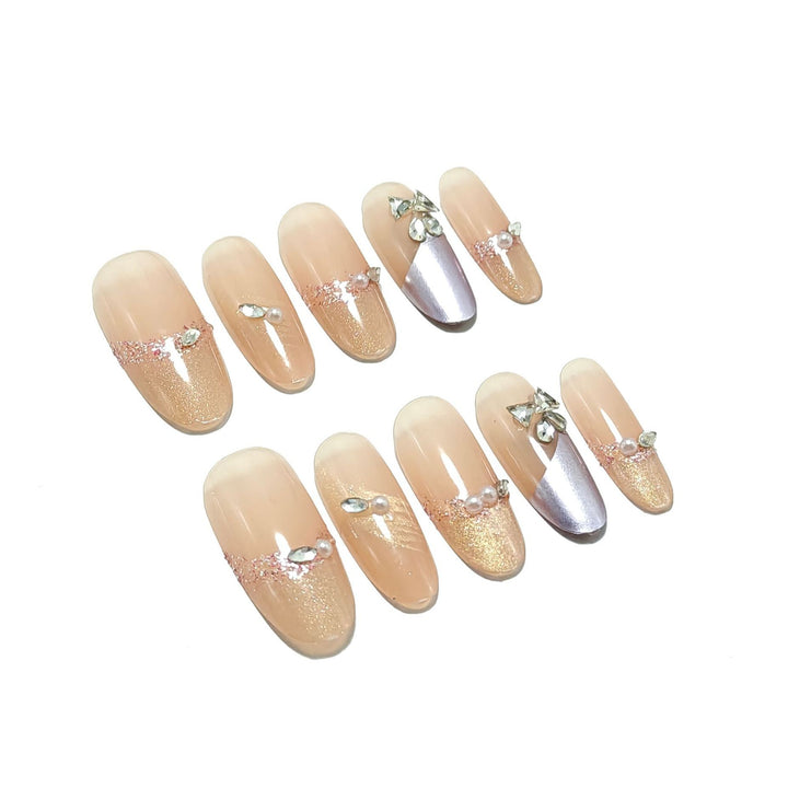 Glamorous artificial nails with rhinestone applications Bowlift
