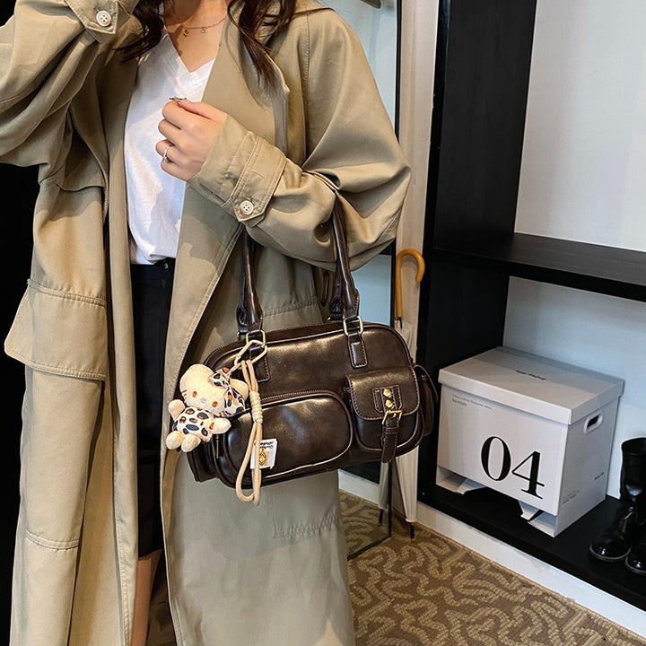 Elegant Handbag with Playful Charms and Multiple Compartments Bowlift